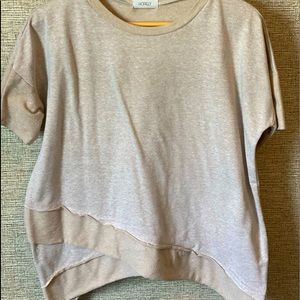 Small ,tan, Tee, with cut out